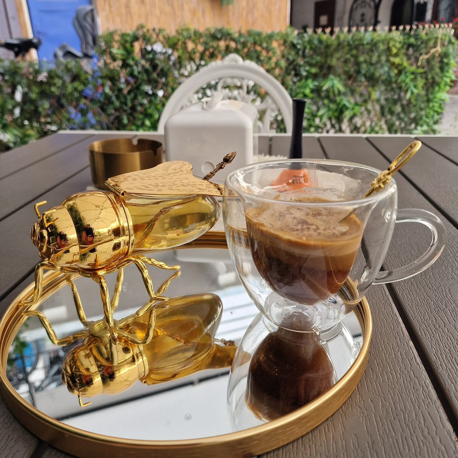 Freshly brewed specialty coffee in a white cup